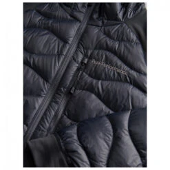 Peak Performance Helium Down Hybrid Hood - Donsjack 9 Peak Performance Helium Down Hybrid Hood - Donsjack -Winterkleding Winkel peak performance helium down hybrid hood donsjack detail 4